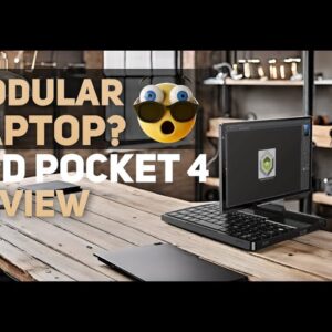 Image featuring a modular laptop, the GPD Pocket 4, on a modern wooden desk in an industrial-style workspace. Text overlay reads 'Modular Laptop? GPD Pocket 4 Review' with an expressive emoji depicting surprise, highlighting the device's unique modular design.