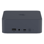 The front view of a compact Beelink EQI12 Mini PC in dark grey. It features a USB-A port, a 3.5mm headphone jack, a USB-C port, and a power button. The casing has a textured design on the top with a circular logo.