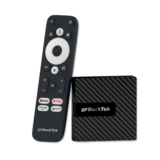 RockTek GB1 Android TV box shown alongside its dedicated remote control. The compact device has a sleek, textured design. The remote features a circular navigation pad, voice control button, and dedicated buttons for popular streaming services like YouTube, Netflix, and Prime Video, along with an 'Apps' button for quick access to installed applications